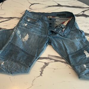 Rockstar jeans distressed cut off with slight flare reinforced knee